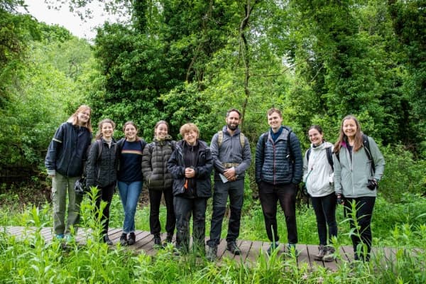 The NbSI team standing with Judy Webb in the Lye Valley. Photo by Aline Soterroni.