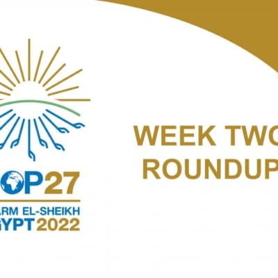 COP27 Logo. Text: COP27. Sharm El-Sheikh. Egypt 2022. Week two roundup.