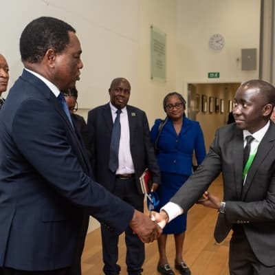 NbSI's Lubasi shaking hands with HH president of Zambia